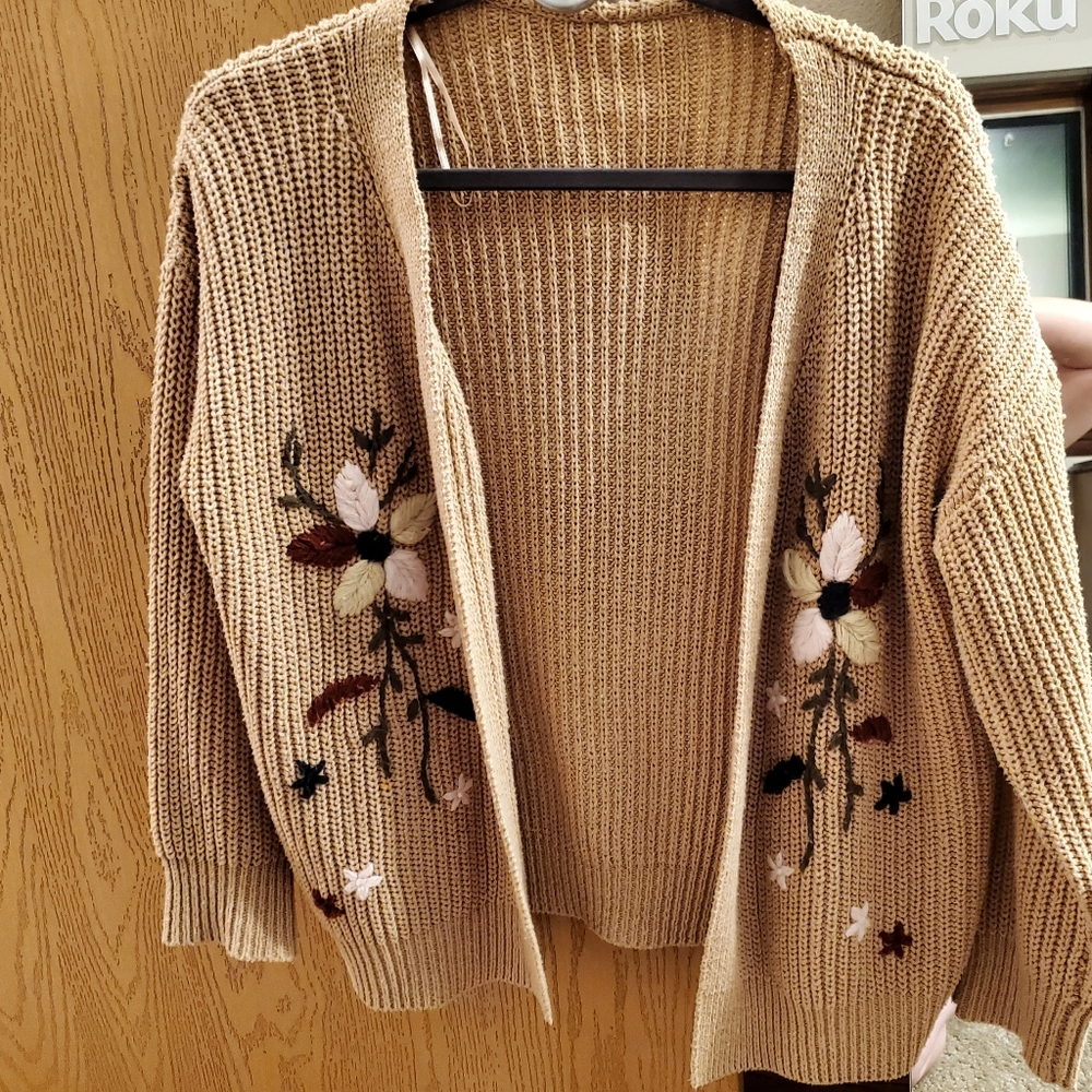 Tan with embroidered floral design